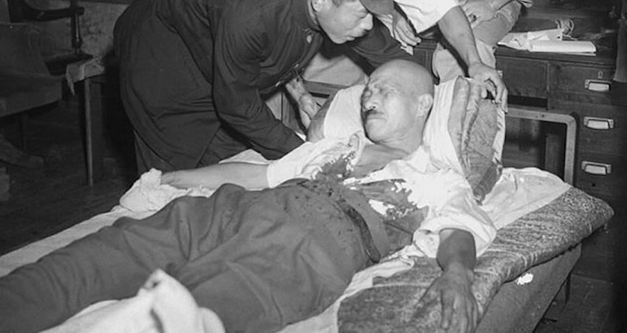 tojo-being-helped.jpg